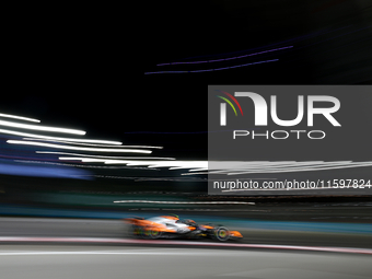 Lando Norris of the United Kingdom drives the McLaren Formula 1 Team MCL38 during the F1 Grand Prix of Singapore at Marina Bay Street Circui...