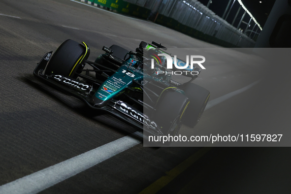 Lance Stroll of Canada drives the Aston Martin Aramco F1 Team AMR25 during the F1 Grand Prix of Singapore at Marina Bay Street Circuit in Si...