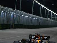 Max Verstappen of the Netherlands drives the Red Bull Racing-Honda RBPT RB20 during the F1 Grand Prix of Singapore at Marina Bay Street Circ...