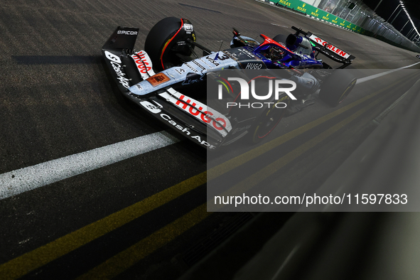 Daniel Ricciardo of Australia drives the Visa Cash App RB F1 Team VCARB 01 during the F1 Grand Prix of Singapore at Marina Bay Street Circui...