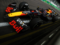 Max Verstappen of the Netherlands drives the Red Bull Racing-Honda RBPT RB20 during the F1 Grand Prix of Singapore at Marina Bay Street Circ...