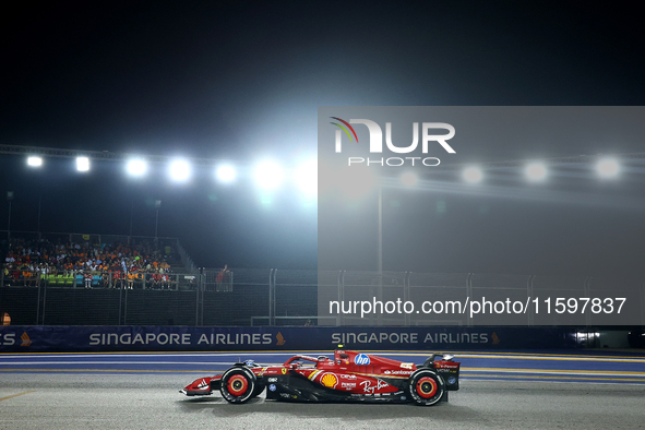 Carlos Sainz of Spain drives the Scuderia Ferrari SF-24 during the F1 Grand Prix of Singapore at Marina Bay Street Circuit in Singapore, Sin...