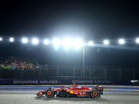 Carlos Sainz of Spain drives the Scuderia Ferrari SF-24 during the F1 Grand Prix of Singapore at Marina Bay Street Circuit in Singapore, Sin...