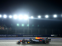 Sergio Perez of Mexico drives the Red Bull Racing-Honda RBPT RB20 during the F1 Grand Prix of Singapore at Marina Bay Street Circuit in Sing...