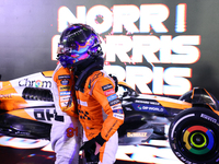 Oscar Piastri of Australia and the McLaren Formula 1 Team and Lando Norris of the United Kingdom and the McLaren Formula 1 Team embrace duri...