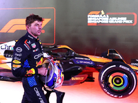 Max Verstappen of the Netherlands and Red Bull Racing-Honda RBPT reacts during the F1 Grand Prix of Singapore at Marina Bay Street Circuit i...