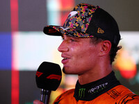 Lando Norris of the United Kingdom and McLaren Formula 1 Team celebrates winning the F1 Grand Prix of Singapore at Marina Bay Street Circuit...