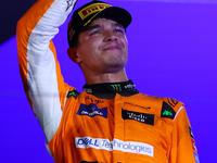 Lando Norris of the United Kingdom and McLaren Formula 1 Team celebrates winning the F1 Grand Prix of Singapore at Marina Bay Street Circuit...