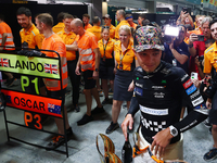 Lando Norris of the United Kingdom and the McLaren Formula 1 Team and Oscar Piastri of Australia and the McLaren Formula 1 Team celebrate fi...