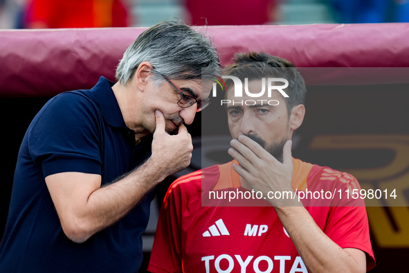 Ivan Juric head coach of AS Roma talks to Matteo Paro during the Serie A Enilive match between AS Roma and Udinese Calcio at Stadio Olimpico...