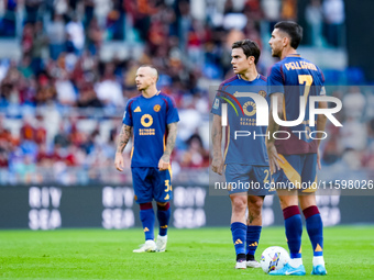 Paulo Dybala of AS Roma and Lorenzo Pellegrini of AS Roma during the Serie A Enilive match between AS Roma and Udinese Calcio at Stadio Olim...