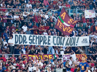 Supporters of AS Roma show a banner in support of Daniele De Rossi during the Serie A Enilive match between AS Roma and Udinese Calcio at St...