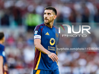 Lorenzo Pellegrini of AS Roma looks on during the Serie A Enilive match between AS Roma and Udinese Calcio at Stadio Olimpico on September 2...