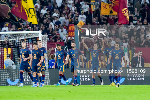 Paulo Dybala of AS Roma celebrates scoring second goal during the Serie A Enilive match between AS Roma and Udinese Calcio at Stadio Olimpic...