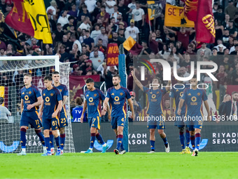 Paulo Dybala of AS Roma celebrates scoring second goal during the Serie A Enilive match between AS Roma and Udinese Calcio at Stadio Olimpic...