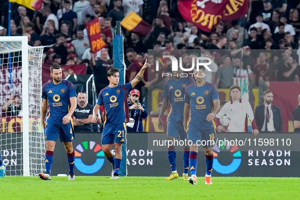 Paulo Dybala of AS Roma celebrates scoring second goal during the Serie A Enilive match between AS Roma and Udinese Calcio at Stadio Olimpic...