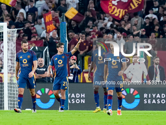 Paulo Dybala of AS Roma celebrates scoring second goal during the Serie A Enilive match between AS Roma and Udinese Calcio at Stadio Olimpic...