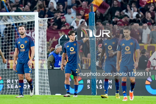 Paulo Dybala of AS Roma celebrates scoring second goal during the Serie A Enilive match between AS Roma and Udinese Calcio at Stadio Olimpic...