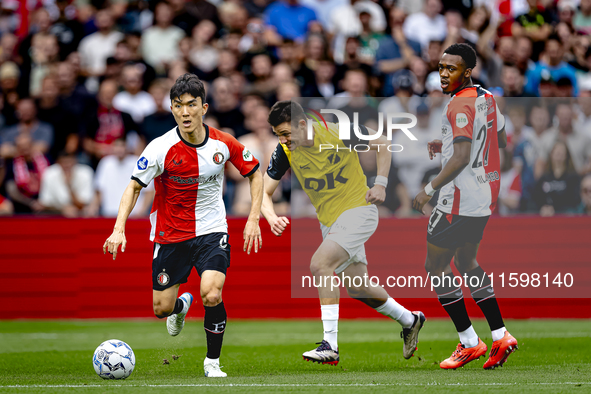 Feyenoord Rotterdam midfielder Inbeom Hwang, NAC Breda defender Dominik Janosek, and Feyenoord Rotterdam midfielder Antoni Milambo during th...