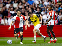 Feyenoord Rotterdam midfielder Inbeom Hwang, NAC Breda defender Dominik Janosek, and Feyenoord Rotterdam midfielder Antoni Milambo during th...