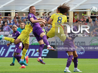 Pietro Comuzzo of ACF Fiorentina and Matteo Guendouzi of SS Lazio ,battle for the ball during the Italian Serie A football match between ACF...