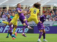 Pietro Comuzzo of ACF Fiorentina and Matteo Guendouzi of SS Lazio ,battle for the ball during the Italian Serie A football match between ACF...