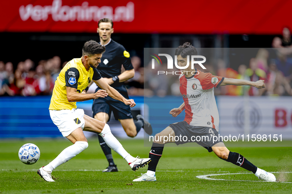 NAC Breda defender Fredrik Oldrup Jensen and Feyenoord Rotterdam midfielder Inbeom Hwang during the match between Feyenoord and NAC at Stadi...