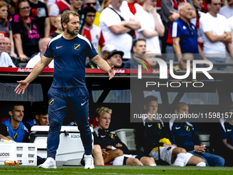 NAC assistant trainer Tomasz Kaczmarek during the match between Feyenoord and NAC at Stadium De Kuip for the Dutch Eredivisie season 2024-20...