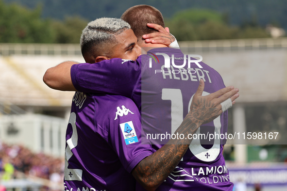 Domilson Cordeiro Dos Santos Dodo and Albert Gudmundsson hug each other immediately after Albert Gudmundsson’s second goal during the Italia...