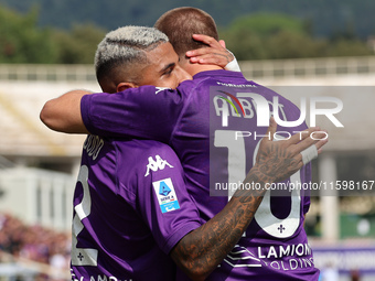 Domilson Cordeiro Dos Santos Dodo and Albert Gudmundsson hug each other immediately after Albert Gudmundsson’s second goal during the Italia...