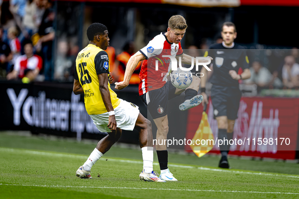 NAC Breda defender Cherrion Valerius and Feyenoord Rotterdam defender Gijs Smal during the match between Feyenoord and NAC at Stadium De Kui...