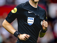 Referee Sander van der Eijk officiates the match between Feyenoord and NAC at Stadium De Kuip for the Dutch Eredivisie season 2024-2025 in R...