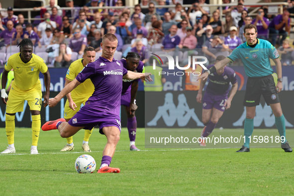 Albert Gudmundsson of ACF Fiorentina is about to shoot the penalty during the Italian Serie A football match between ACF Fiorentina and SS L...