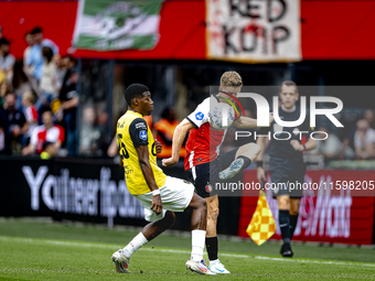 NAC Breda defender Cherrion Valerius and Feyenoord Rotterdam defender Gijs Smal during the match between Feyenoord and NAC at Stadium De Kui...