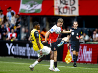 NAC Breda defender Cherrion Valerius and Feyenoord Rotterdam defender Gijs Smal during the match between Feyenoord and NAC at Stadium De Kui...