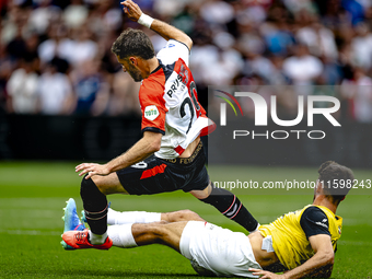 Feyenoord Rotterdam forward Santiago Gimenez and NAC Breda defender Leo Greiml during the match between Feyenoord and NAC at Stadium De Kuip...