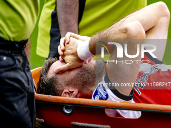 Feyenoord Rotterdam forward Santiago Gimenez gets injured during the match between Feyenoord and NAC at Stadium De Kuip for the Dutch Erediv...