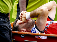 Feyenoord Rotterdam forward Santiago Gimenez gets injured during the match between Feyenoord and NAC at Stadium De Kuip for the Dutch Erediv...