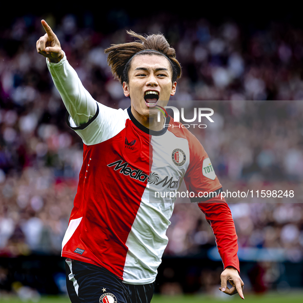 Feyenoord Rotterdam forward Ayase Ueda scores the 1-0 and celebrates the goal during the match between Feyenoord and NAC at Stadium De Kuip...