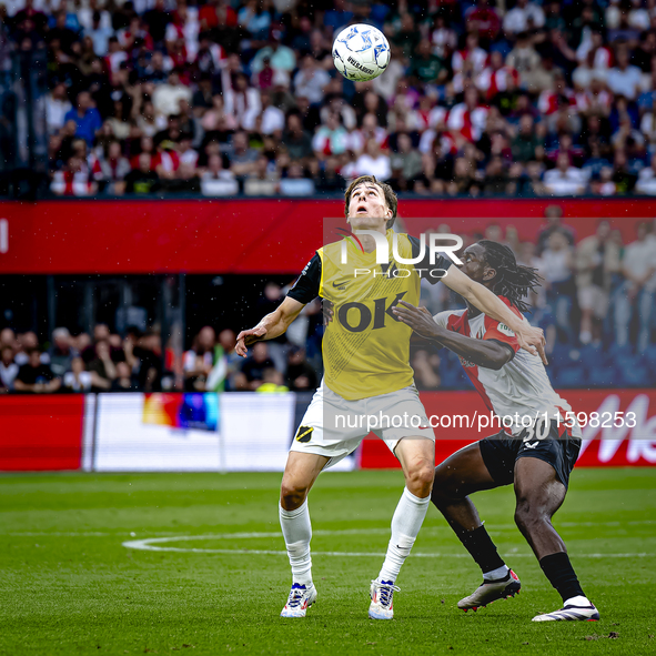 NAC Breda forward Leo Sauer and Feyenoord Rotterdam defender Jordan Lotomba during the match Feyenoord vs. NAC at Stadium De Kuip for the Du...