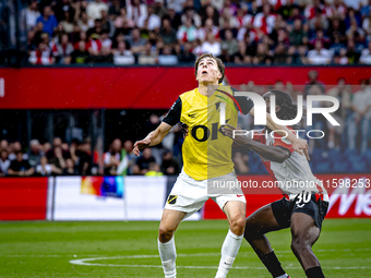 NAC Breda forward Leo Sauer and Feyenoord Rotterdam defender Jordan Lotomba during the match Feyenoord vs. NAC at Stadium De Kuip for the Du...