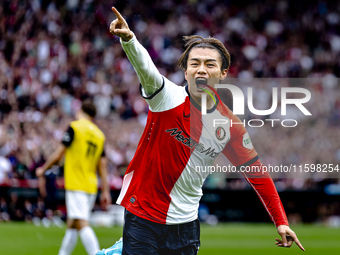 Feyenoord Rotterdam forward Ayase Ueda scores the 1-0 and celebrates the goal during the match between Feyenoord and NAC at Stadium De Kuip...