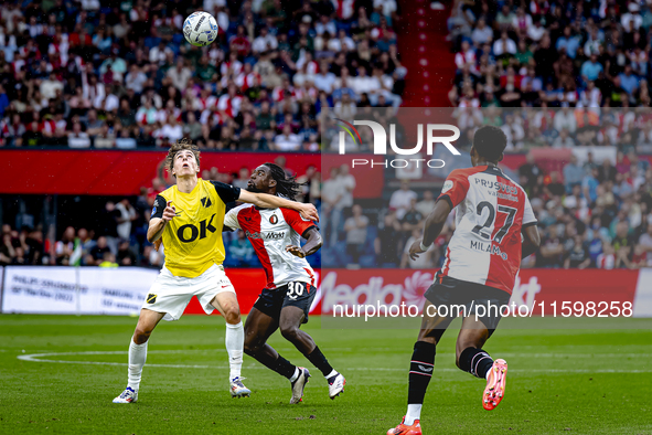 NAC Breda forward Leo Sauer and Feyenoord Rotterdam defender Jordan Lotomba during the match Feyenoord vs. NAC at Stadium De Kuip for the Du...