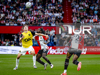 NAC Breda forward Leo Sauer and Feyenoord Rotterdam defender Jordan Lotomba during the match Feyenoord vs. NAC at Stadium De Kuip for the Du...