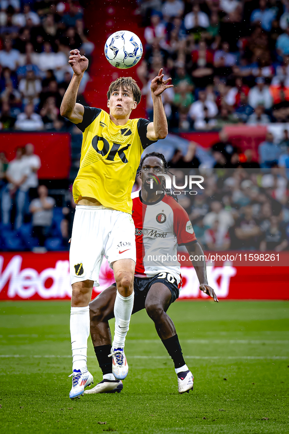 NAC Breda forward Leo Sauer and Feyenoord Rotterdam defender Jordan Lotomba during the match Feyenoord vs. NAC at Stadium De Kuip for the Du...