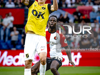 NAC Breda forward Leo Sauer and Feyenoord Rotterdam defender Jordan Lotomba during the match Feyenoord vs. NAC at Stadium De Kuip for the Du...