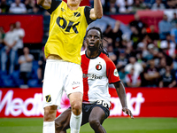 NAC Breda forward Leo Sauer and Feyenoord Rotterdam defender Jordan Lotomba during the match Feyenoord vs. NAC at Stadium De Kuip for the Du...