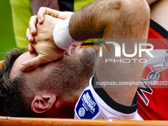 Feyenoord Rotterdam forward Santiago Gimenez gets injured during the match between Feyenoord and NAC at Stadium De Kuip for the Dutch Erediv...