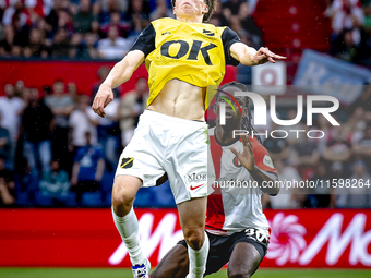 NAC Breda forward Leo Sauer and Feyenoord Rotterdam defender Jordan Lotomba during the match Feyenoord vs. NAC at Stadium De Kuip for the Du...