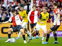 NAC Breda player Elias Mar Omarsson and Feyenoord Rotterdam midfielder Inbeom Hwang during the match Feyenoord vs. NAC at Stadium De Kuip fo...